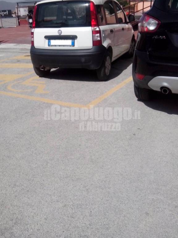 parcheggio auto comune posti disabili